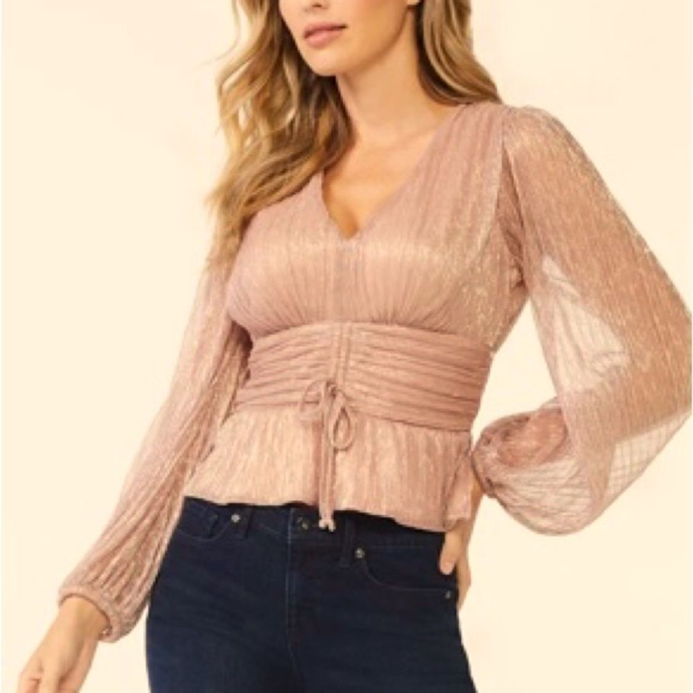 🛍️ Sofia Jeans by Sofia Vergara
Womens Shimmer Peplum Top with
Long Sleeves